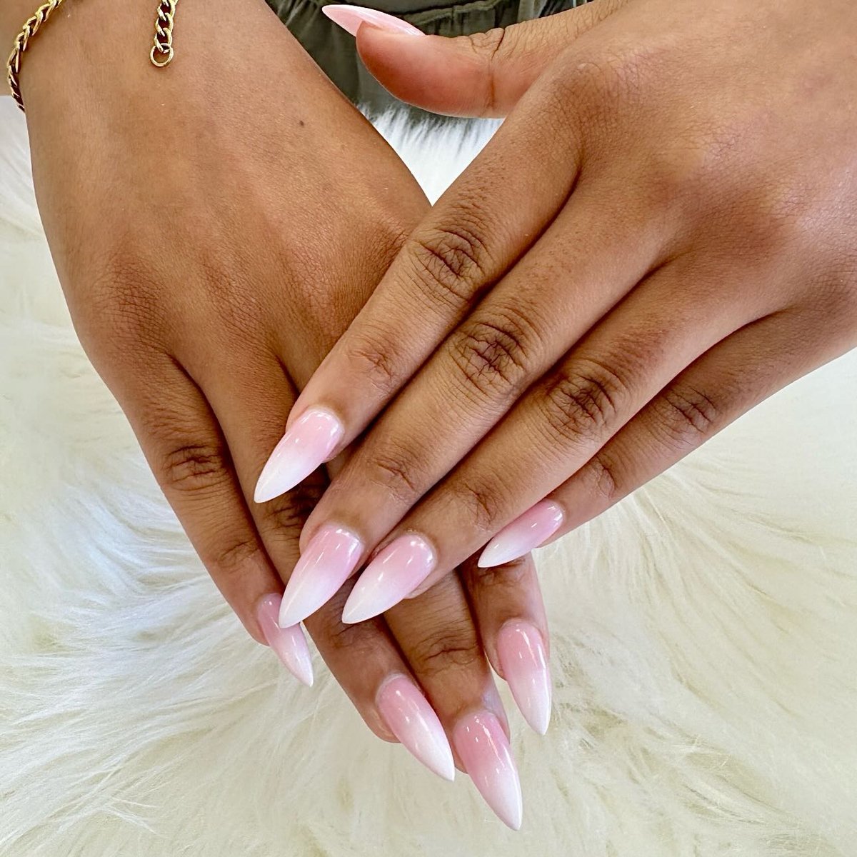 Nude pink-to-white ombre stiletto nails