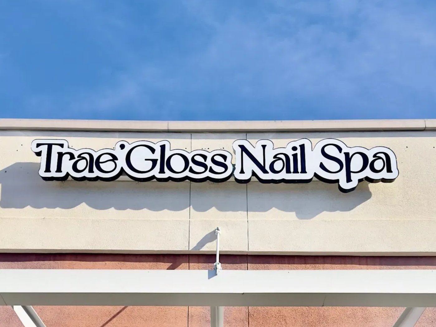 Trae'Gloss Nail Spa storefront sign on Trabuco Rd